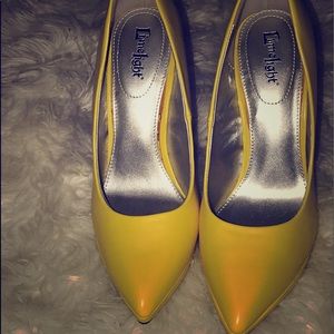 Yellow heeled shoes